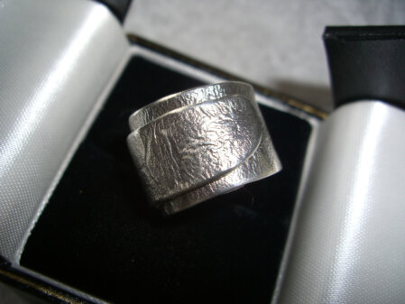 Wickelring geschmort Geschmorter Wickelring aus 925er Silber. Groesse und Breite nach Wunsch.
